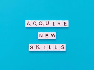 scrabbble-tiles-spelling-out-acquire-new-skills